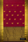 Maroon Dual Tone Kanchipuram Silk Saree with Zari Butta on the body and Zari Border.  displayed on a mannequin