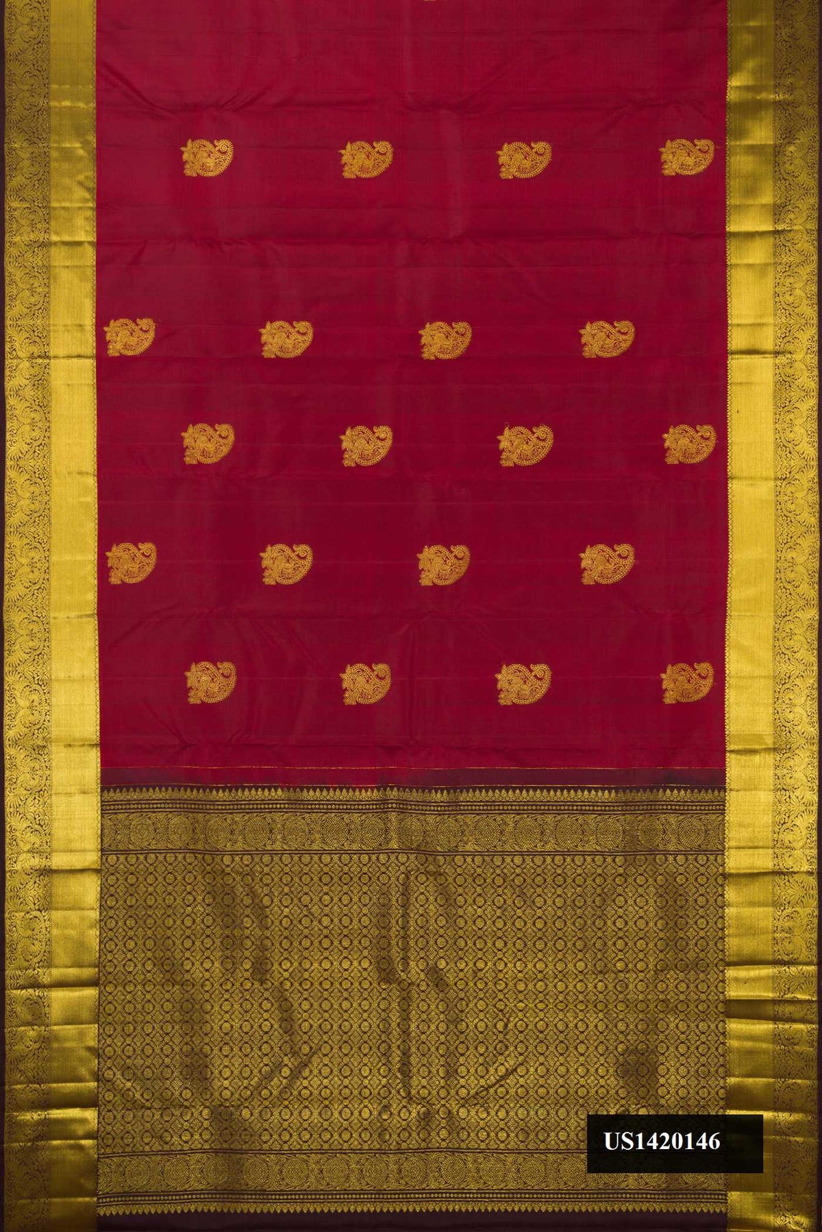Maroon Dual Tone Kanchipuram Silk Saree with Zari Butta on the body and Zari Border.  displayed on a mannequin