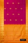 Magenta Dual Tone Kanchipuram Silk Saree with Zari Butta on the body and Zari Border.  displayed on a mannequin
