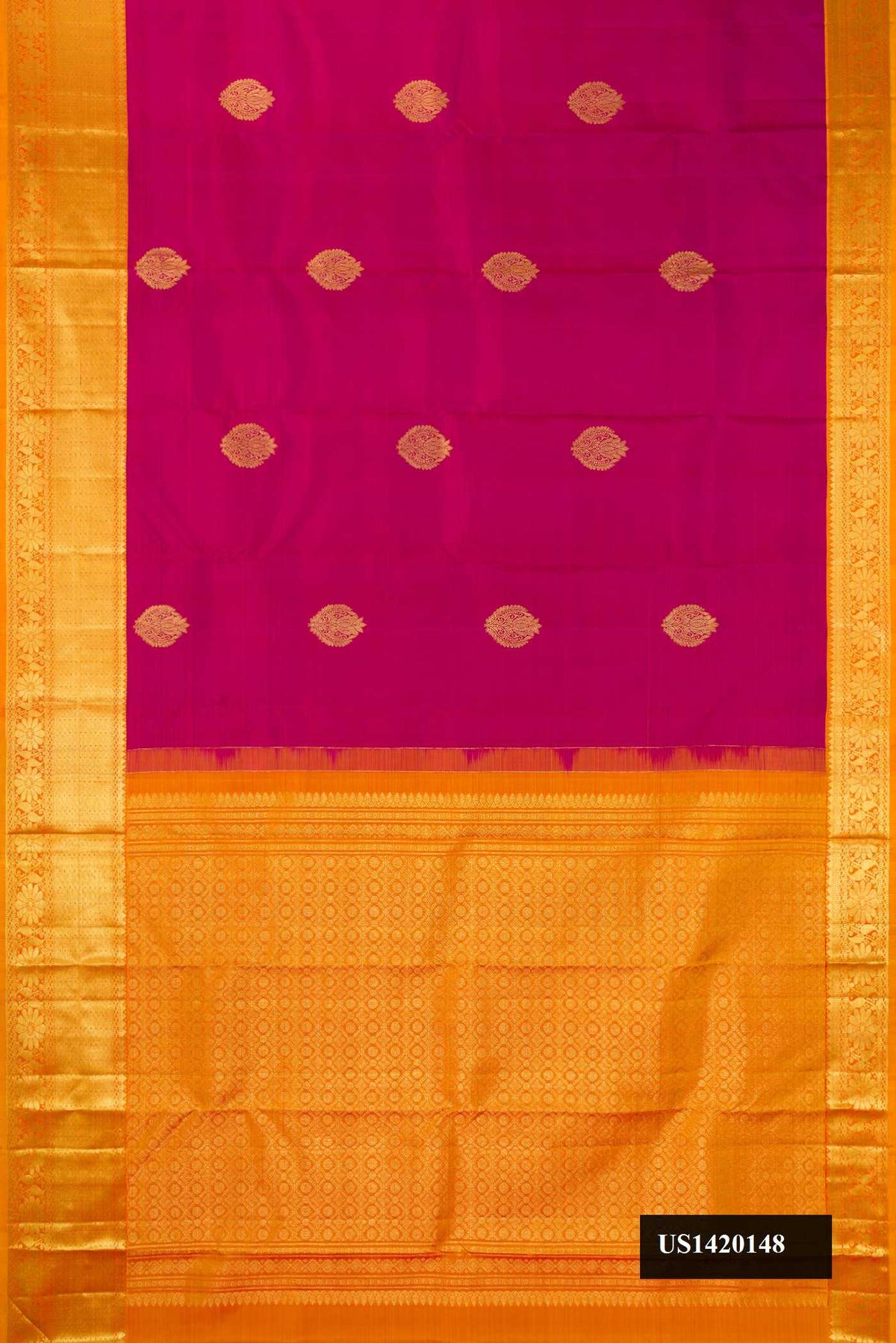 Magenta Dual Tone Kanchipuram Silk Saree with Zari Butta on the body and Zari Border.  displayed on a mannequin