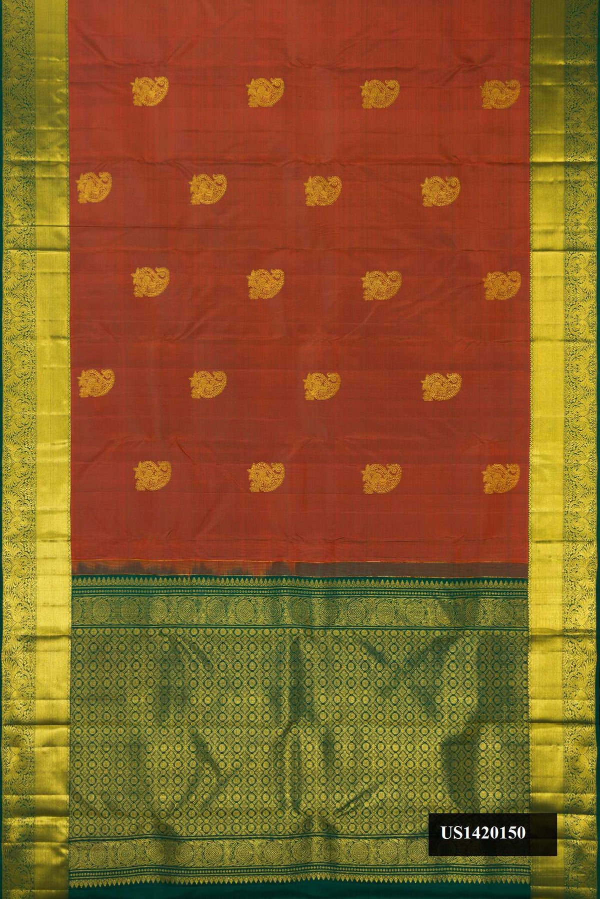 Rust Dual Tone Kanchipuram Silk Saree with Zari Butta on the body and Zari Border.  displayed on a mannequin