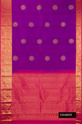 Purple Dual Tone Kanchipuram Silk Saree with Zari Butta on the body and Zari Border.  displayed on a mannequin