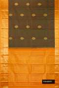 Mehandi Green Dual Tone Kanchipuram Silk Saree with Zari Butta on the body and Zari Border.  displayed on a mannequin