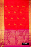 Coral Dual Tone Kanchipuram Silk Saree with Zari Butta on the body and Zari Border.  displayed on a mannequin