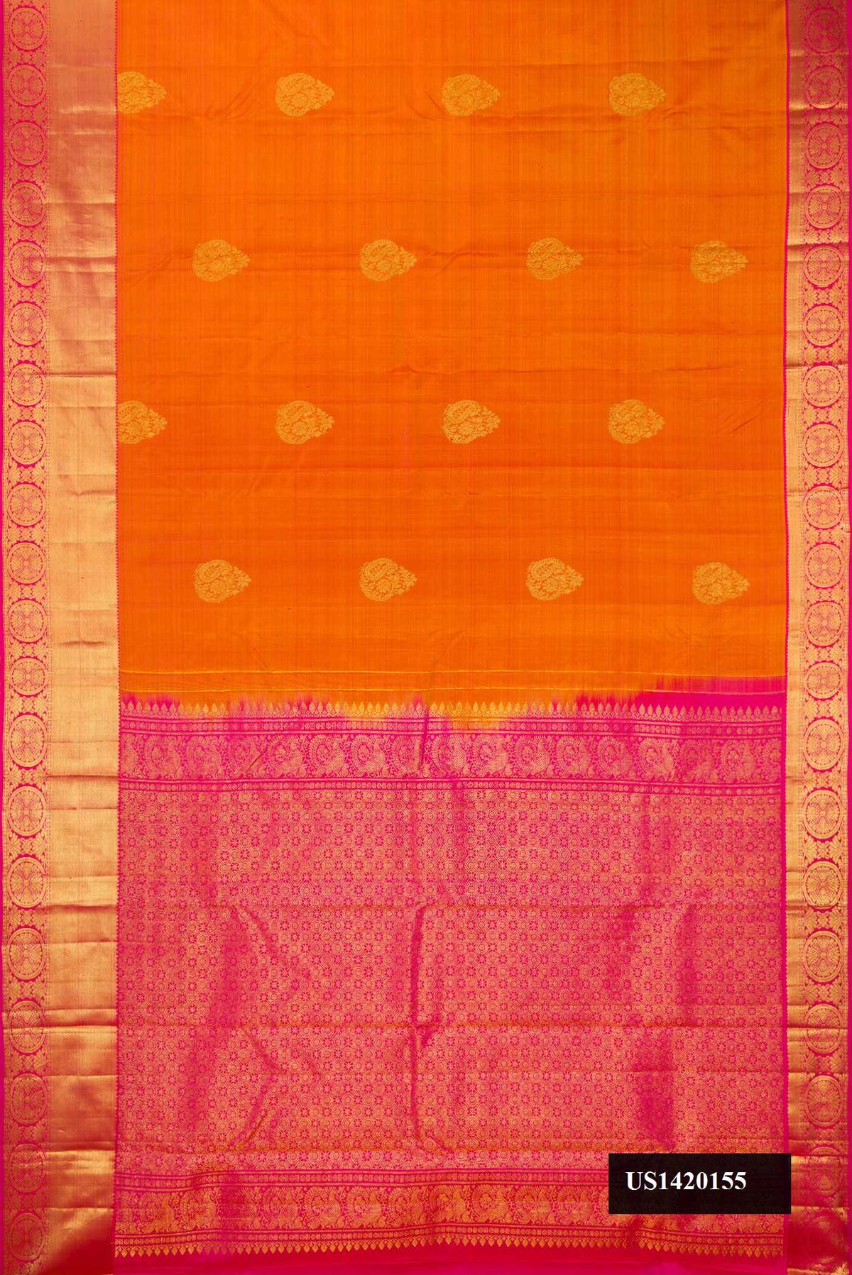 Mustard Dual Tone Kanchipuram Silk Saree with Zari Butta on the body and Zari Border.  displayed on a mannequin