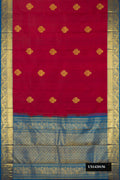Maroon Dual Tone Kanchipuram Silk Saree with Zari Butta on the body and Zari Border.  displayed on a mannequin