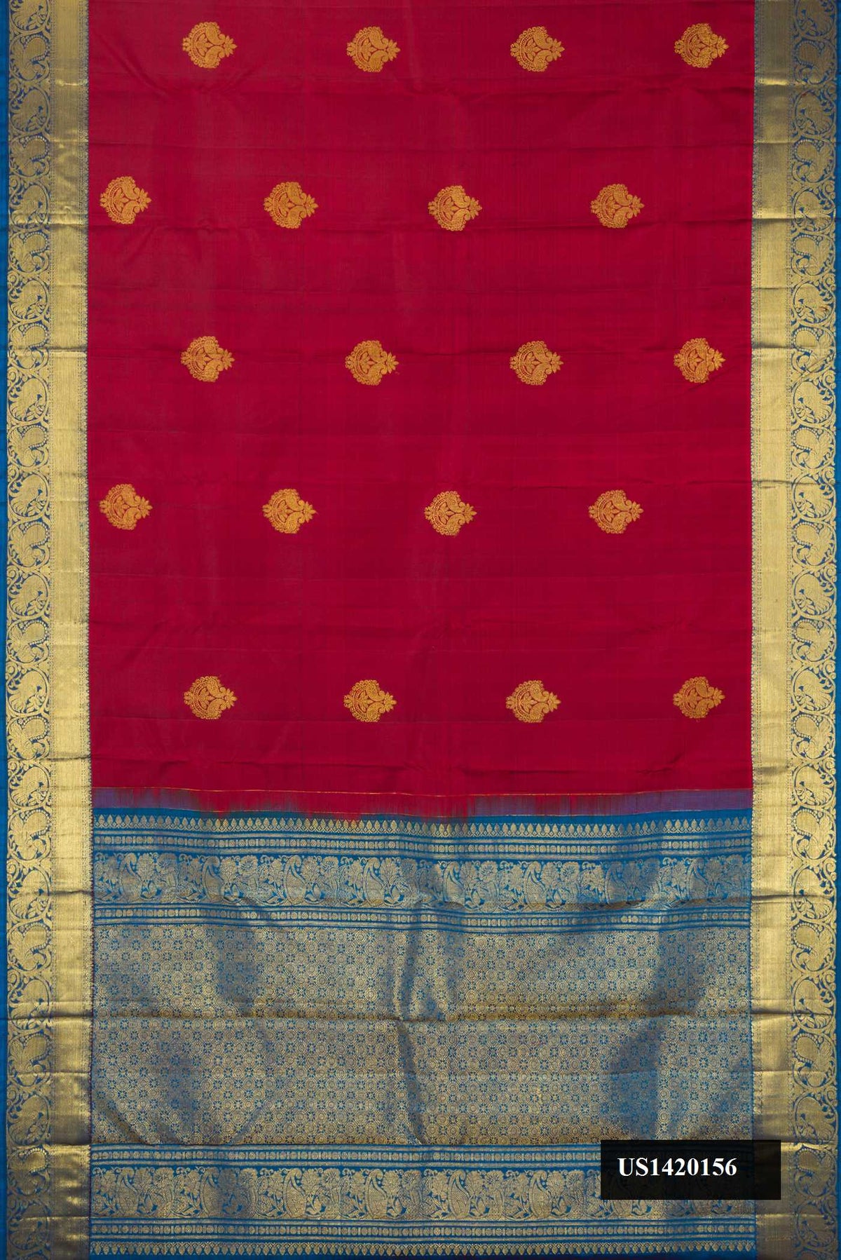 Maroon Dual Tone Kanchipuram Silk Saree with Zari Butta on the body and Zari Border.  displayed on a mannequin