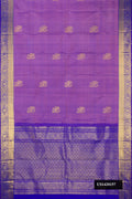 Lavender Dual Tone Kanchipuram Silk Saree with Zari Butta on the body and Zari Border.  displayed on a mannequin