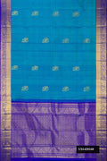 Blue Dual Tone Kanchipuram Silk Saree with Zari Butta on the body and Zari Border.  displayed on a mannequin