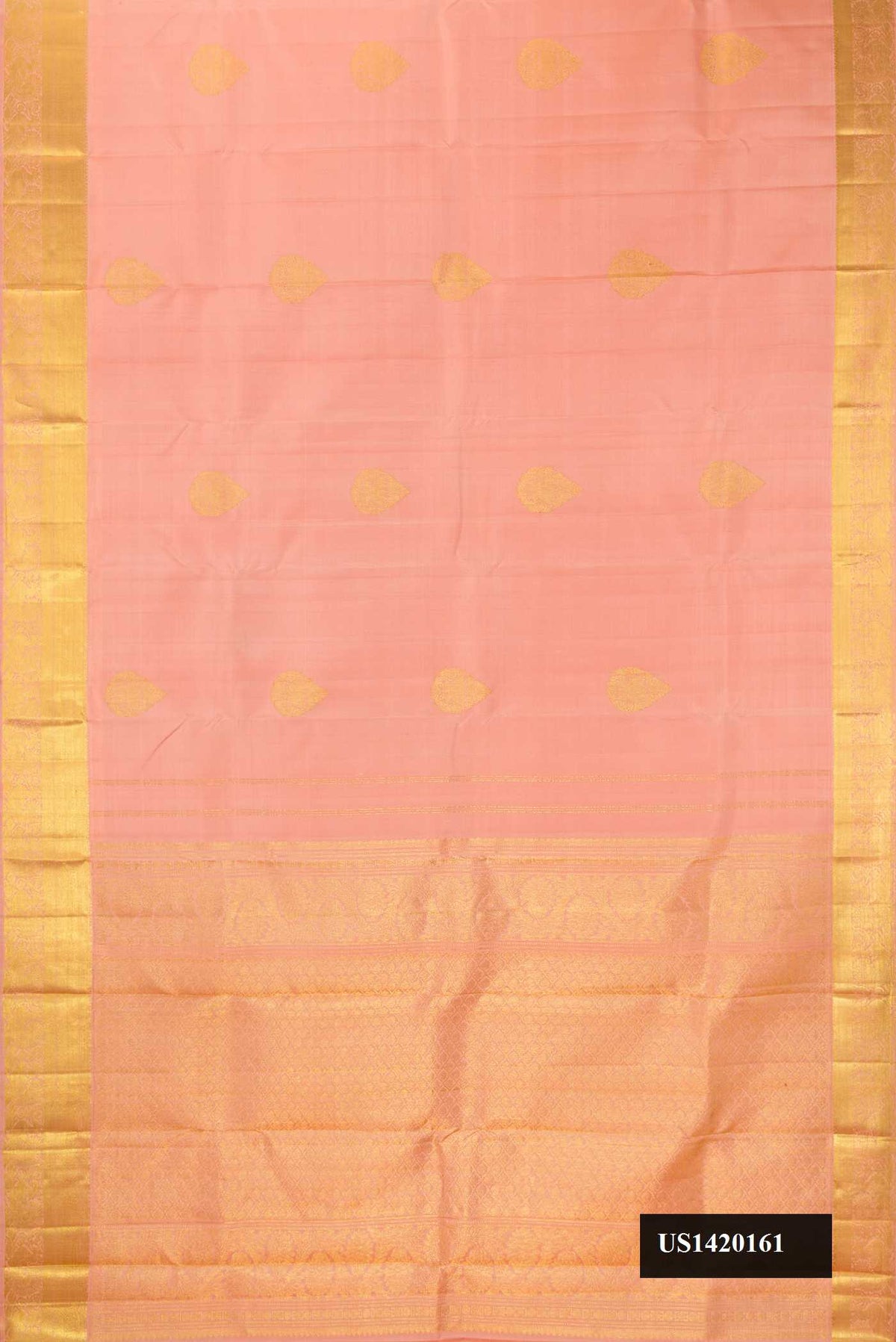Peach Dual Tone Kanchipuram Silk Saree with Zari Butta on the body and Zari Border.  displayed on a mannequin