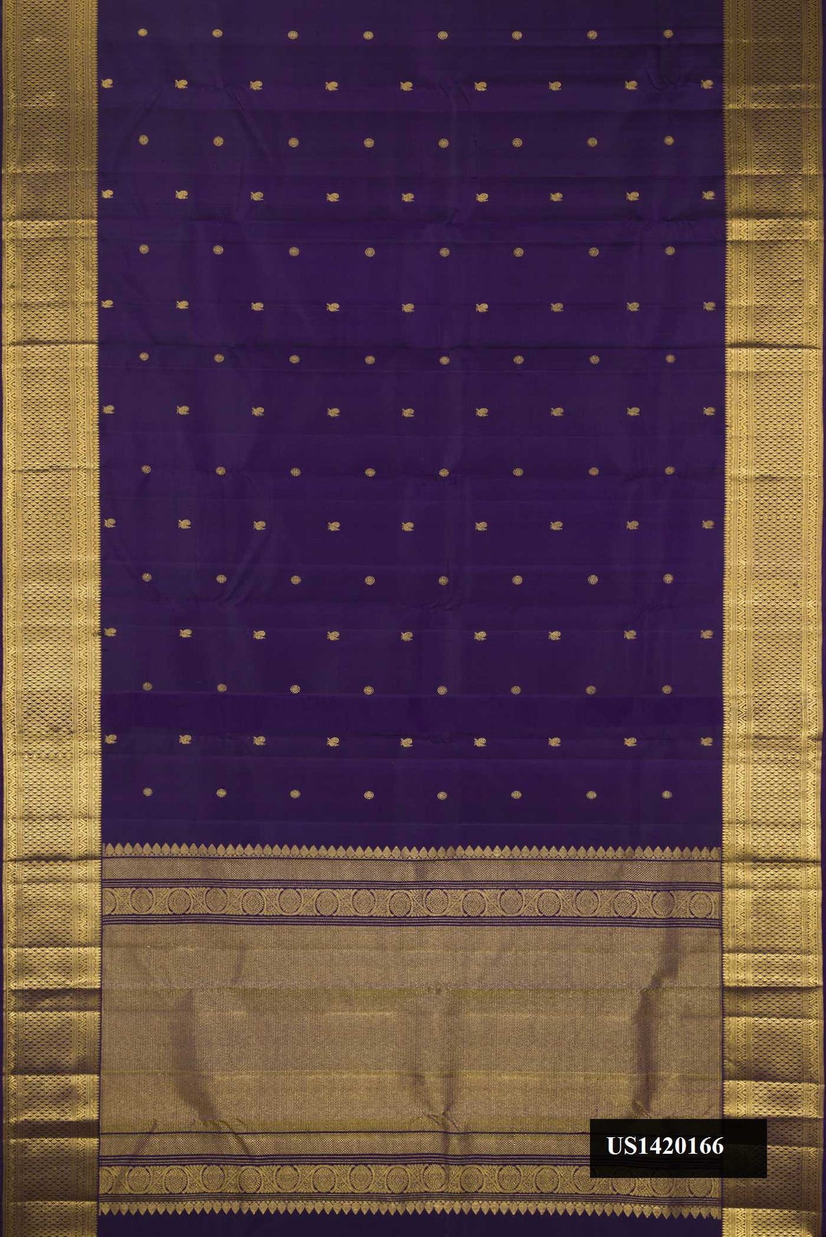 Violet Dual Tone Kanchipuram Silk Saree with Zari Butta on the body and Zari Border.  displayed on a mannequin