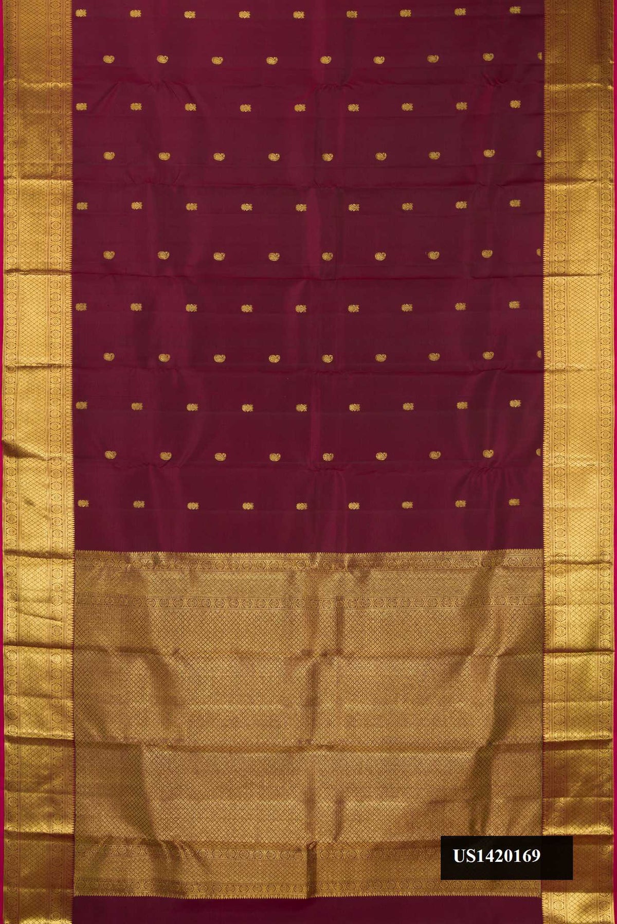 Maroon Dual Tone Kanchipuram Silk Saree with Zari Butta on the body and Zari Border.  displayed on a mannequin
