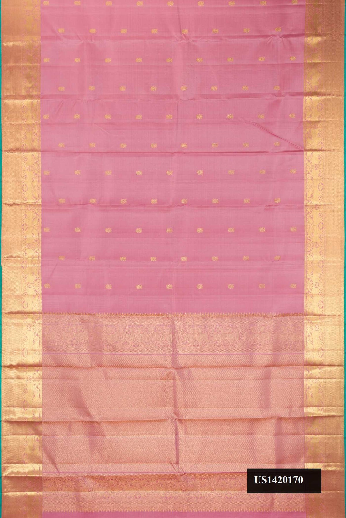 Rose Gold Dual Tone Kanchipuram Silk Saree with Zari Butta on the body and Zari Border.  displayed on a mannequin