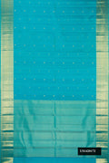 Sky Blue Dual Tone Kanchipuram Silk Saree with Zari Butta on the body and Zari Border.  displayed on a mannequin