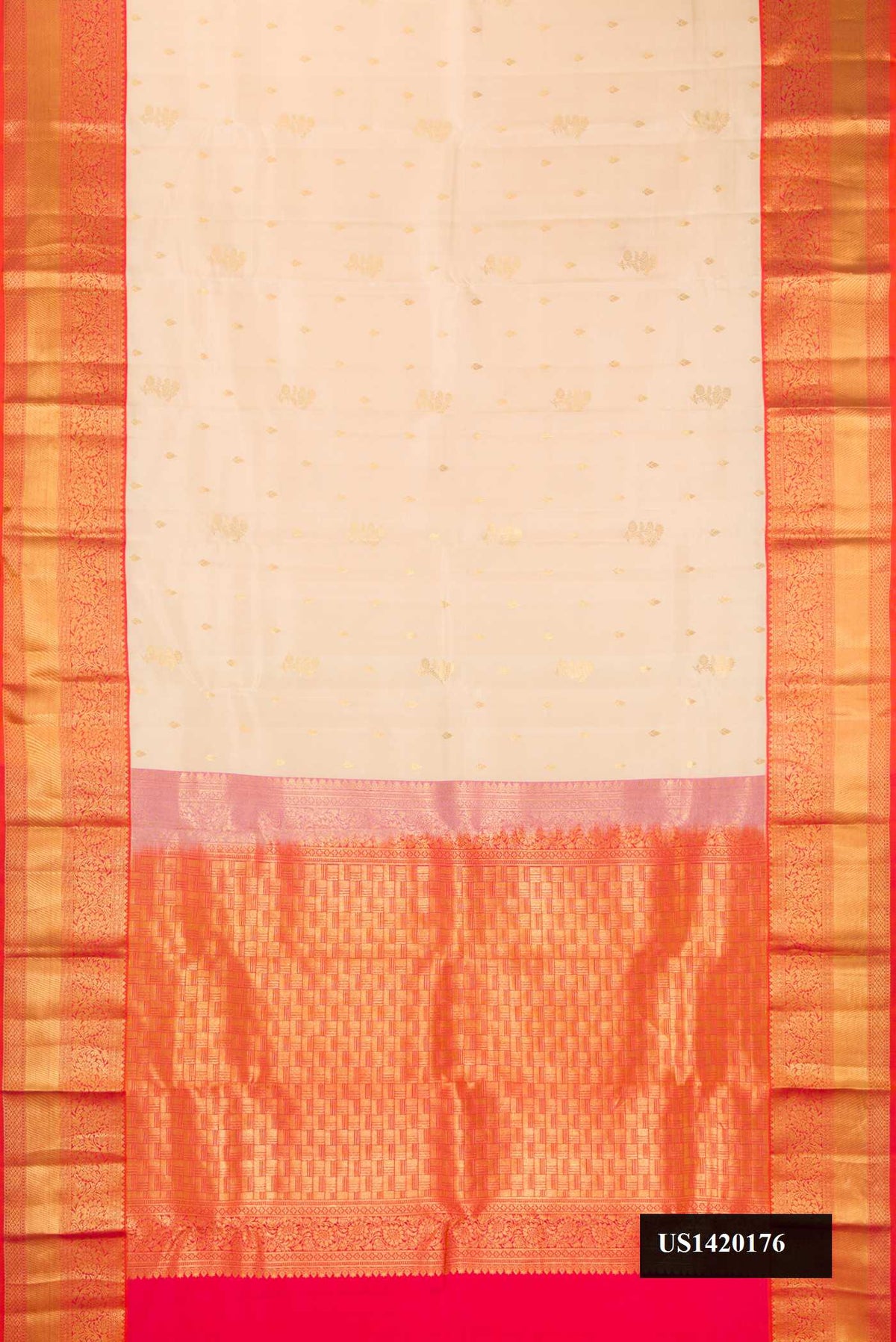 Beige Dual Tone Kanchipuram Silk Saree with Zari Butta on the body and Zari Border.  displayed on a mannequin