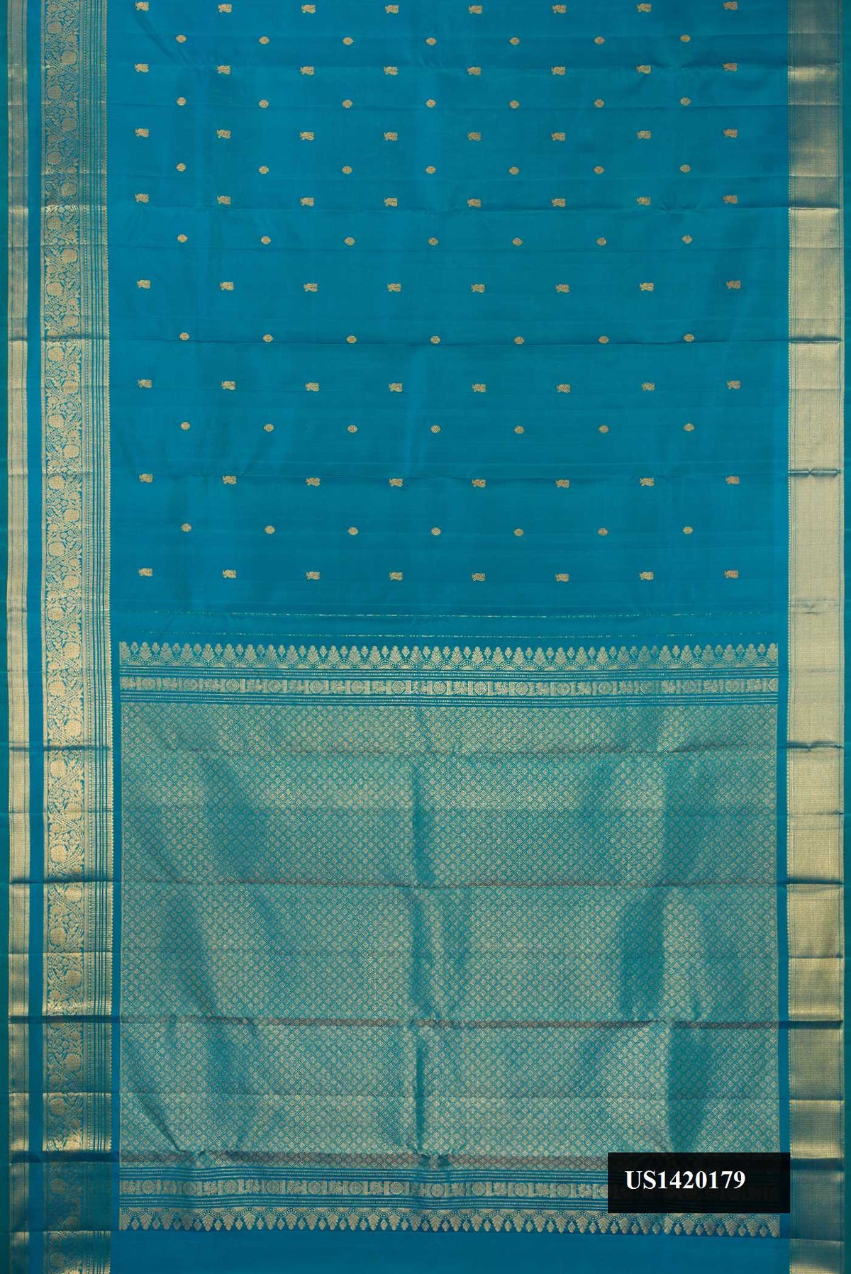 Peacock Blue Dual Tone Kanchipuram Silk Saree with Zari Butta on the body and Zari Border.  displayed on a mannequin