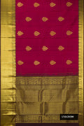 Maroon Dual Tone Kanchipuram Silk Saree with Zari Butta on the body and Zari Border.  displayed on a mannequin