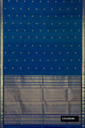 Peacock Blue Dual Tone Kanchipuram Silk Saree with Zari Butta on the body and Zari Border.  displayed on a mannequin