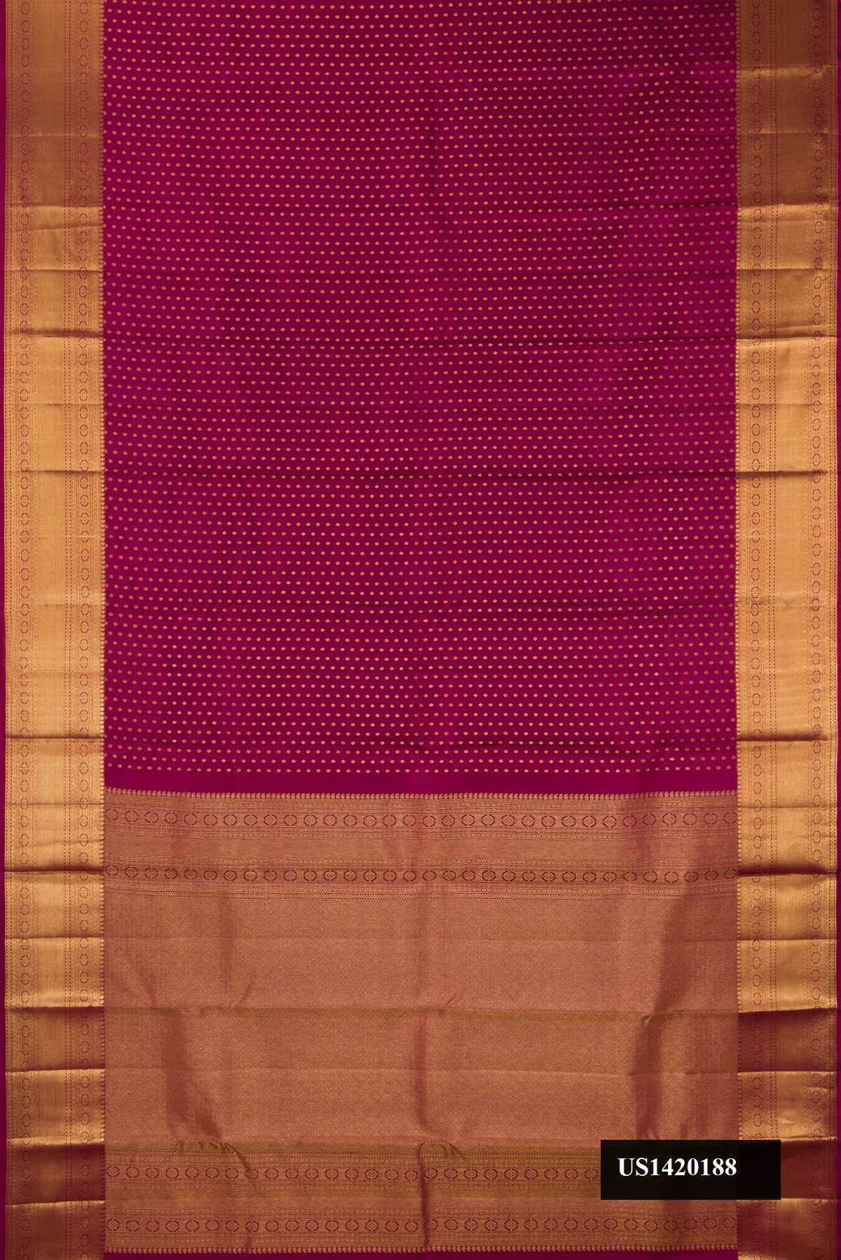 Maroon Dual Tone Kanchipuram Silk Saree with Zari Butta on the body and Zari Border.  displayed on a mannequin