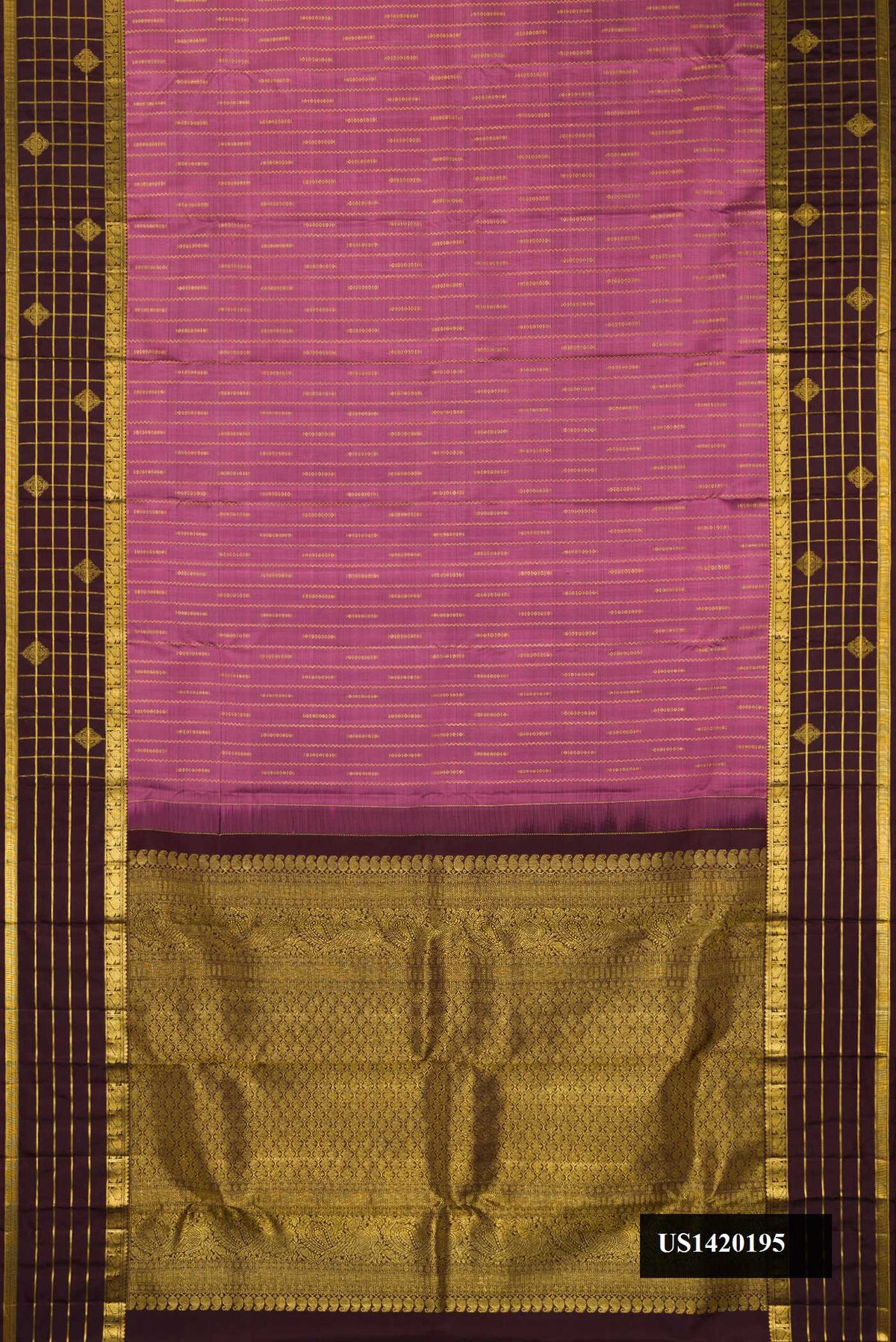 Rose Gold Dual Tone Kanchipuram Silk Saree with Zari Butta on the body and Zari Border.  displayed on a mannequin