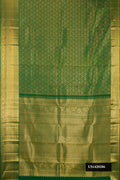 Bottle Green Dual Tone Kanchipuram Silk Saree with Zari Brocade on the body and Zari Border.  displayed on a mannequin