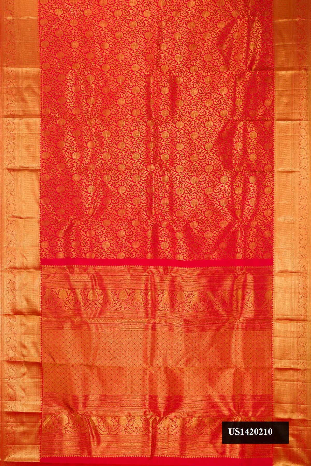 Red Dual Tone Kanchipuram Silk Saree with Zari Brocade on the body and Zari Border.  displayed on a mannequin