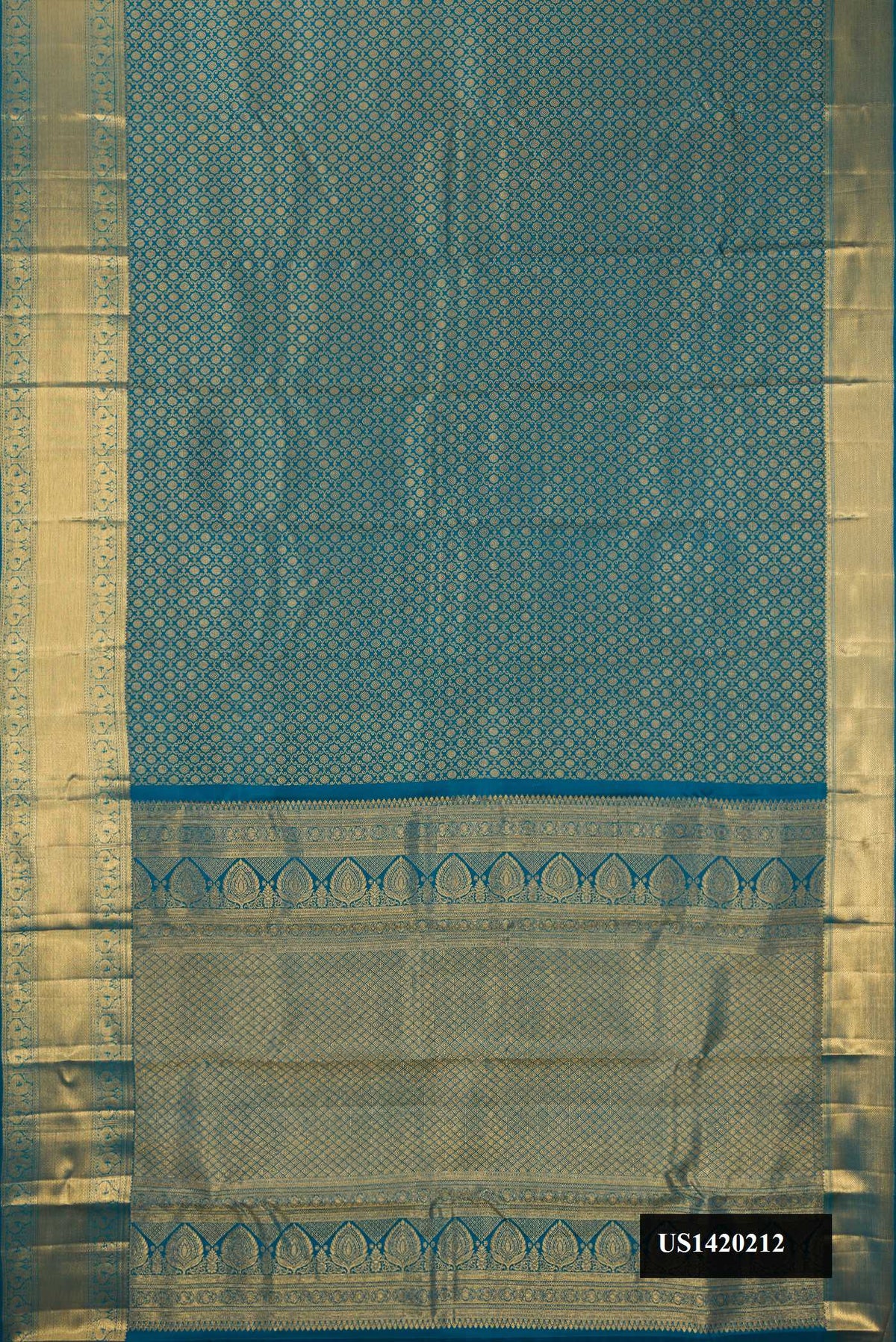 Peacock Blue Dual Tone Kanchipuram Silk Saree with Zari Brocade on the body and Zari Border.  displayed on a mannequin