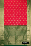 Red Dual Tone Kanchipuram Silk Saree with Zari Butta on the body and Zari Border.  displayed on a mannequin