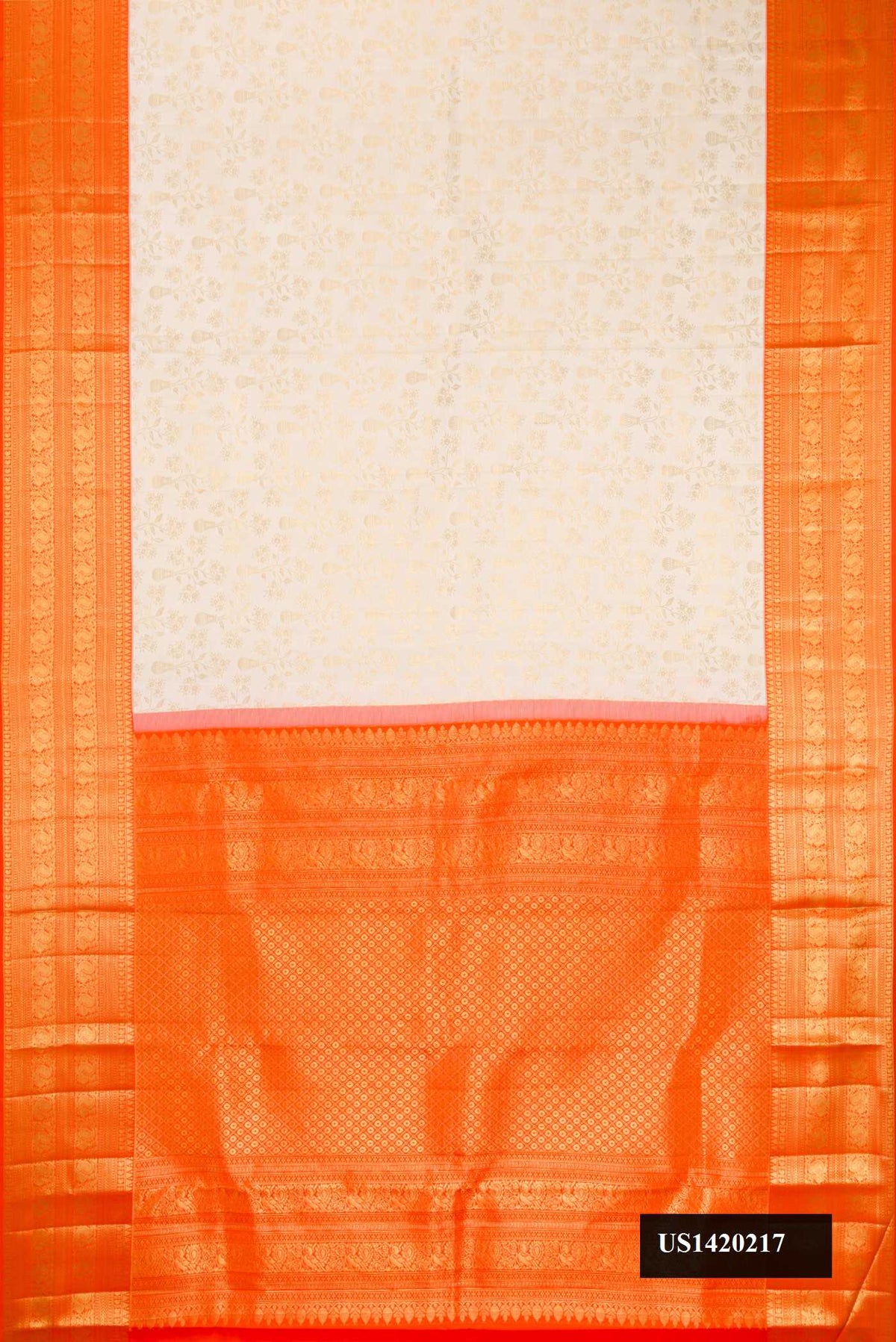 Off White Dual Tone Kanchipuram Silk Saree with Zari Brocade on the body and Zari Border.  displayed on a mannequin