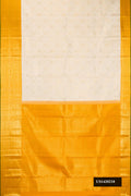Off White Dual Tone Kanchipuram Silk Saree with Zari Brocade on the body and Zari Border.  displayed on a mannequin
