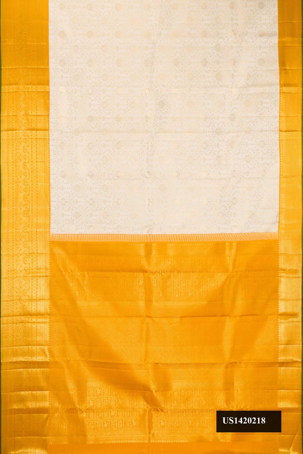 Off White Dual Tone Kanchipuram Silk Saree with Zari Brocade on the body and Zari Border.  displayed on a mannequin