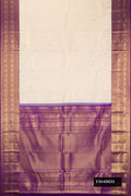 Off White Dual Tone Kanchipuram Silk Saree with Zari Brocade on the body and Zari Border.  displayed on a mannequin