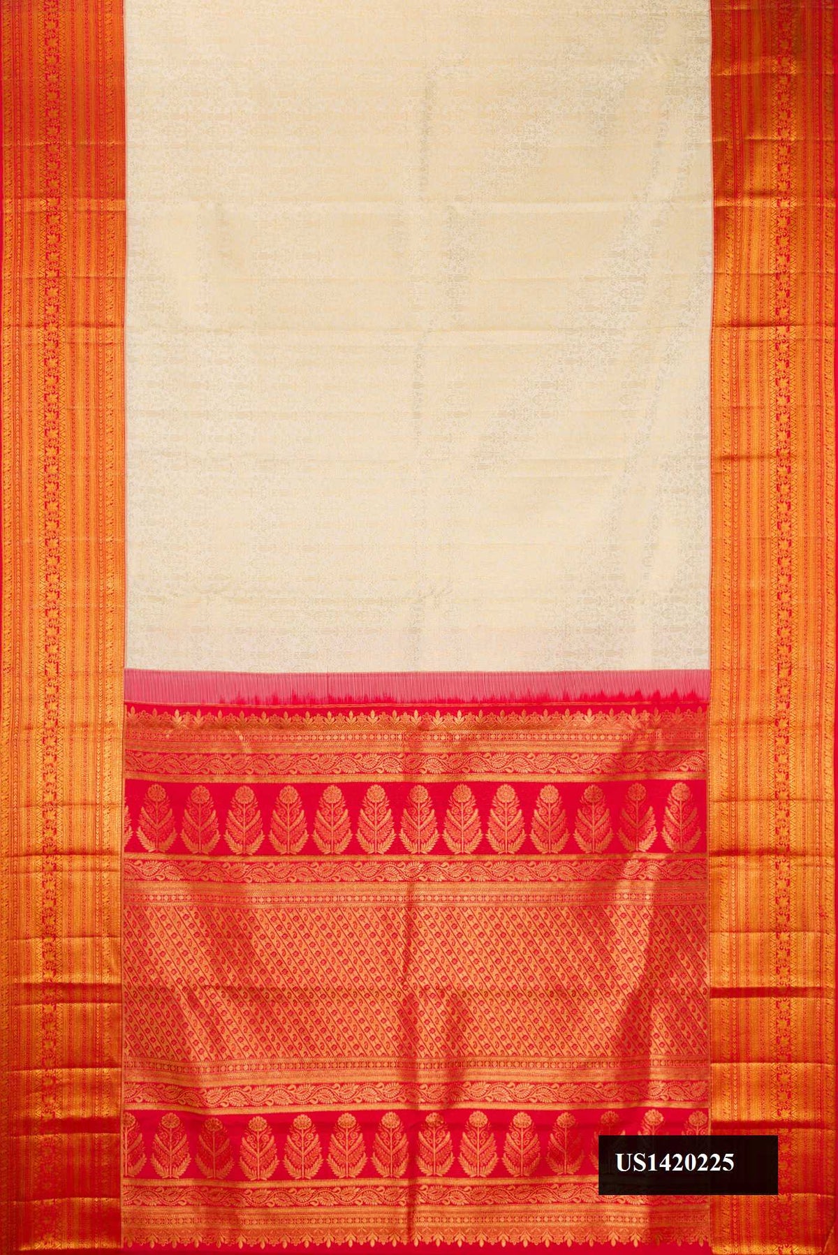 Off White Dual Tone Kanchipuram Silk Saree with Zari Brocade on the body and Zari Border.  displayed on a mannequin