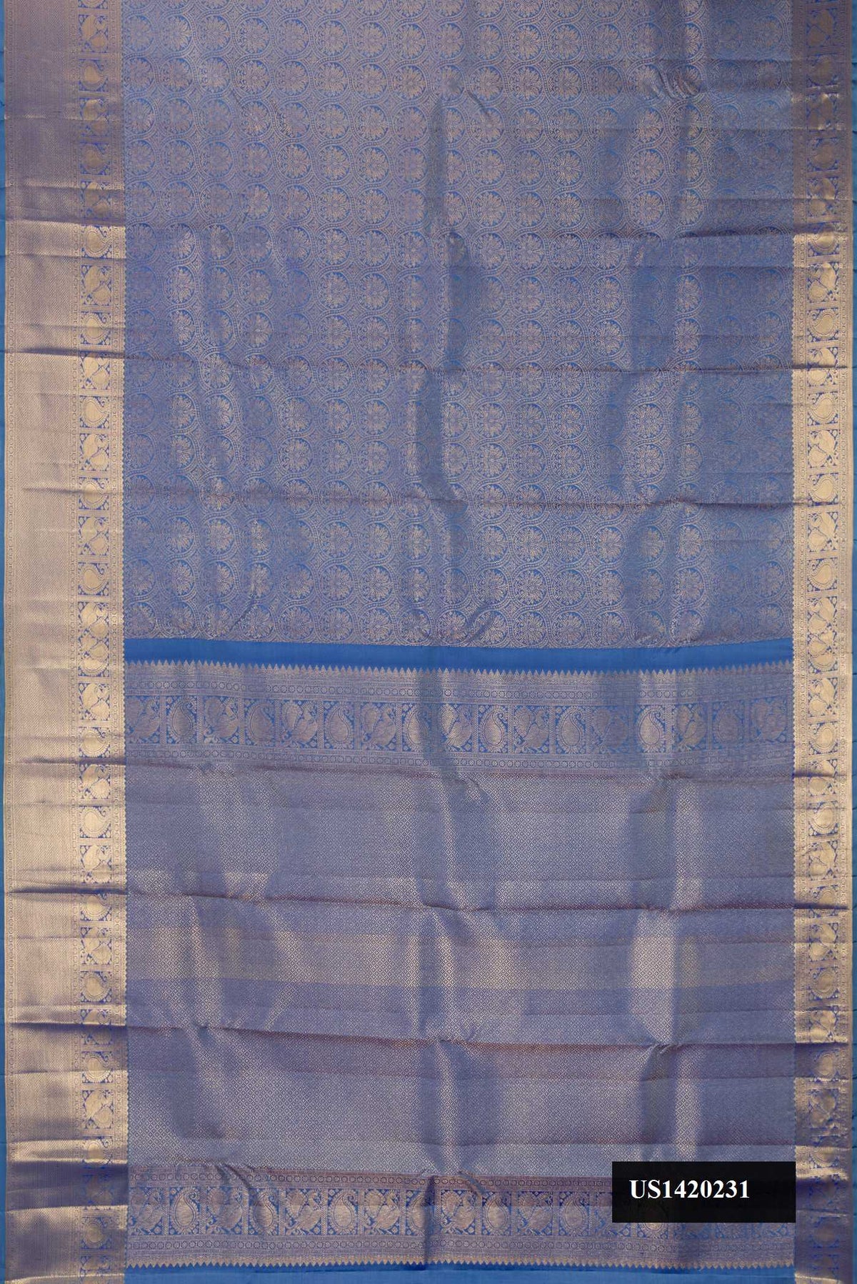 Blue Dual Tone Kanchipuram Silk Saree with Zari Brocade on the body and Zari Border.  displayed on a mannequin