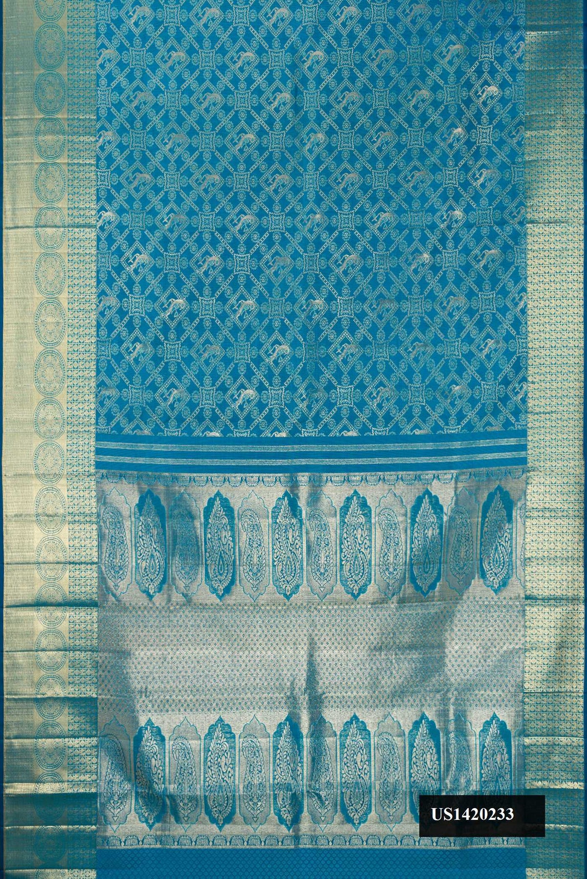 Peacock Blue Dual Tone Kanchipuram Silk Saree with Zari Brocade on the body and Fancy Border.  displayed on a mannequin