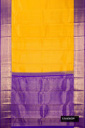 Mustard Dual Tone Kanchipuram Silk Saree with Zari Brocade on the body and Zari Border.  displayed on a mannequin