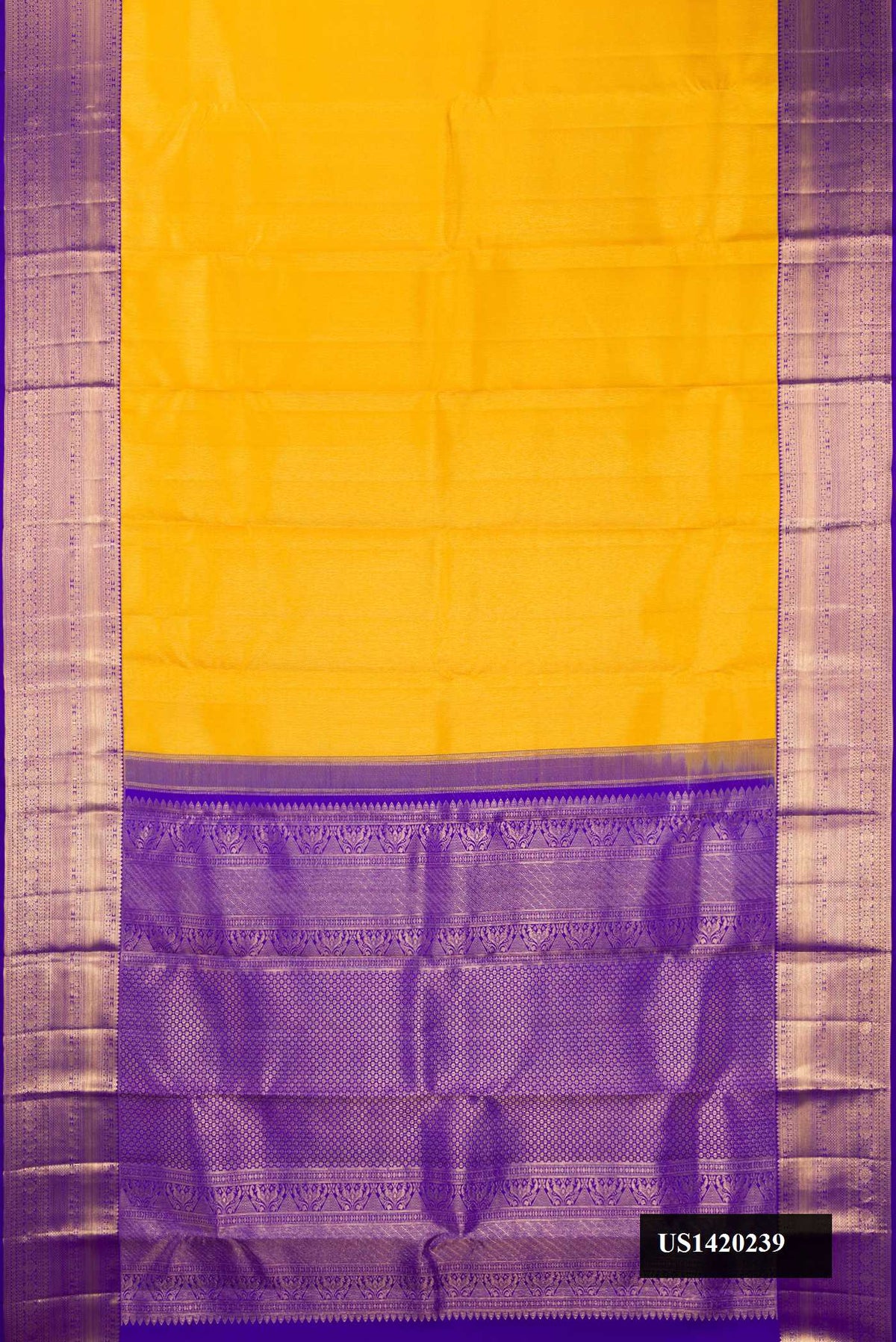 Mustard Dual Tone Kanchipuram Silk Saree with Zari Brocade on the body and Zari Border.  displayed on a mannequin