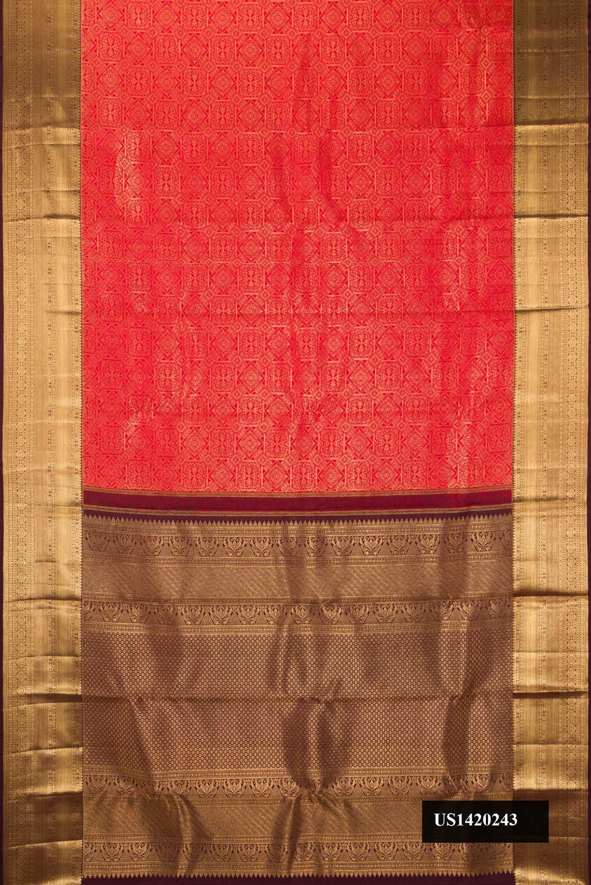 Red Dual Tone Kanchipuram Silk Saree with Zari Brocade on the body and Zari Border.  displayed on a mannequin