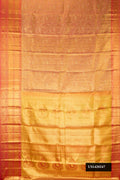 Pink Dual Tone Kanchipuram Tissue Silk Saree with Zari Brocade on the body and Zari Border.  displayed on a mannequin