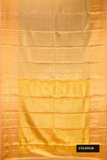 Golden Peach Dual Tone Kanchipuram Tissue Silk Saree with Zari Brocade on the body and Zari Border.  displayed on a mannequin