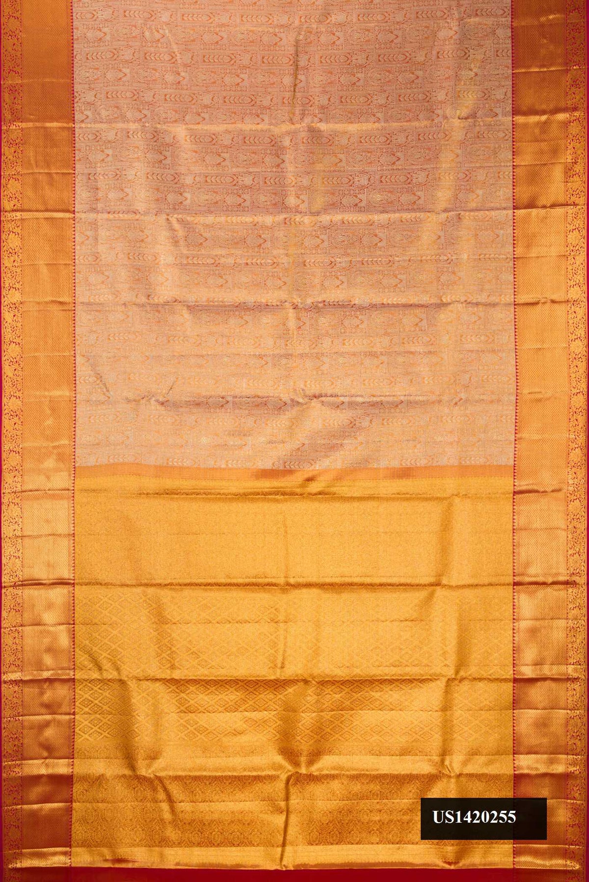 Gold Dual Tone Kanchipuram Tissue Silk Saree with Zari Brocade on the body and Zari Border.  displayed on a mannequin