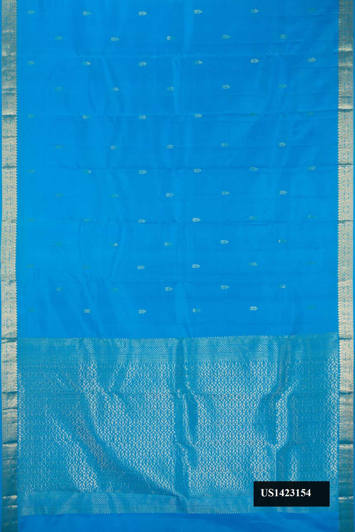 Blue Dual Tone Kanchipuram Silk Saree with Zari Butta on the body and Zari Border.  displayed on a mannequin