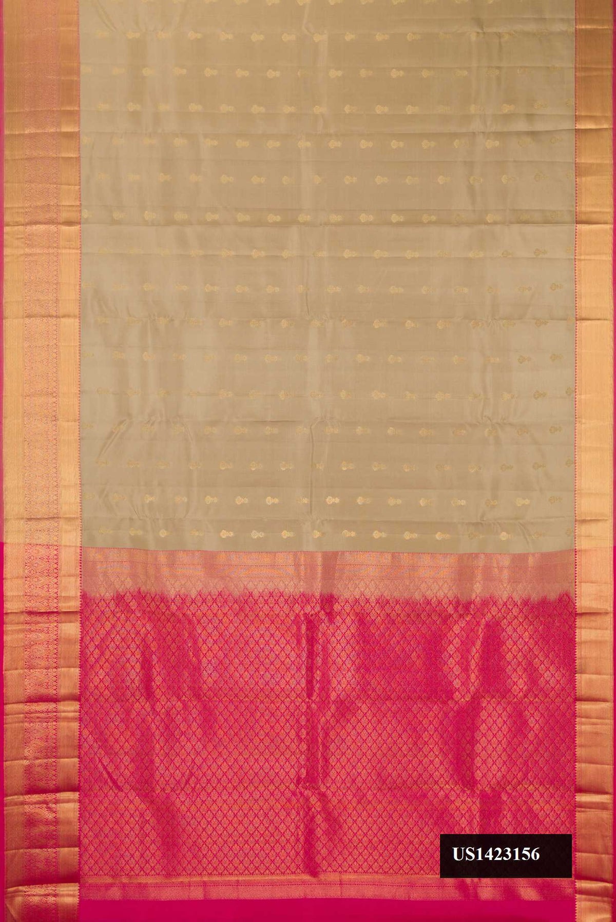 Beige Dual Tone Kanchipuram Silk Saree with Zari Butta on the body and Zari Border.  displayed on a mannequin