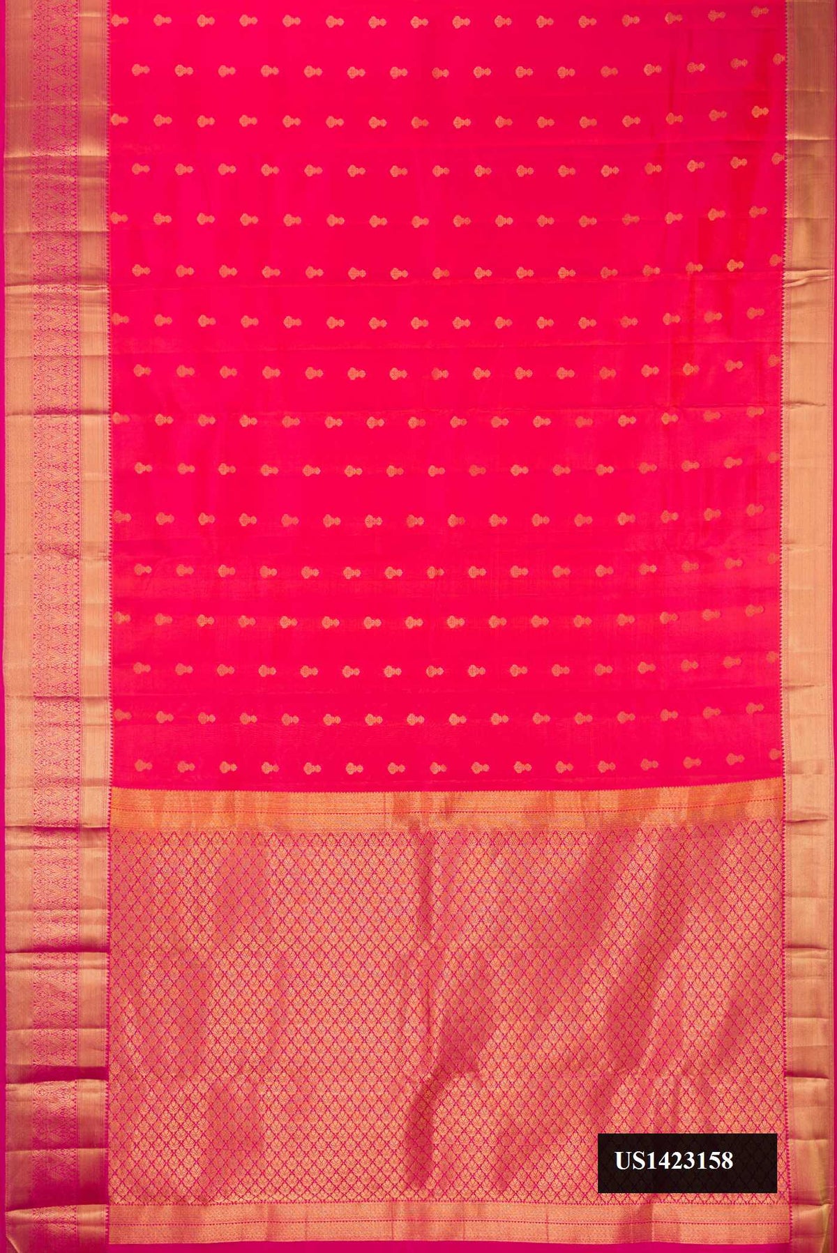 Coral Dual Tone Kanchipuram Silk Saree with Zari Butta on the body and Zari Border.  displayed on a mannequin