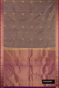 Brown Dual Tone Kanchipuram Silk Saree with Zari Butta on the body and Zari Border.  displayed on a mannequin