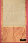 Beige Dual Tone Kanchipuram Silk Saree with Zari Butta on the body and Zari Border.  displayed on a mannequin