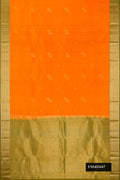Orange Dual Tone Kanchipuram Silk Saree with Zari Butta on the body and Zari Border.  displayed on a mannequin