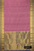 Rose Gold Dual Tone Kanchipuram Silk Saree with Zari Butta on the body and Zari Border.  displayed on a mannequin