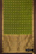 Mehandi Green Dual Tone Kanchipuram Silk Saree with Zari Butta on the body and Zari Border.  displayed on a mannequin