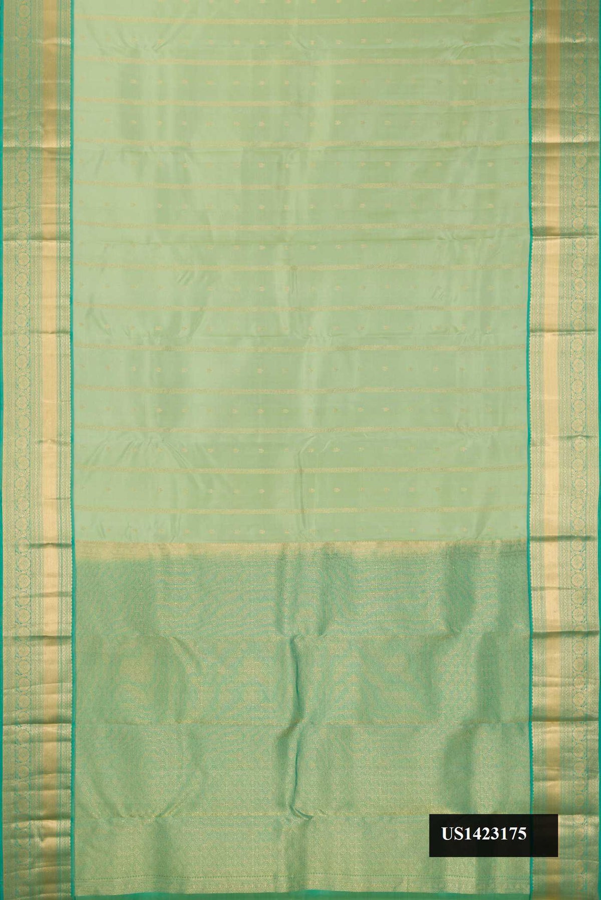 Pista Green Dual Tone Kanchipuram Silk Saree with Zari Butta on the body and Zari Border.  displayed on a mannequin